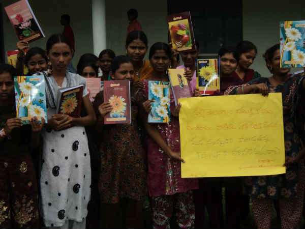 NRIs supply note books for poor NRIs supply note books for poor