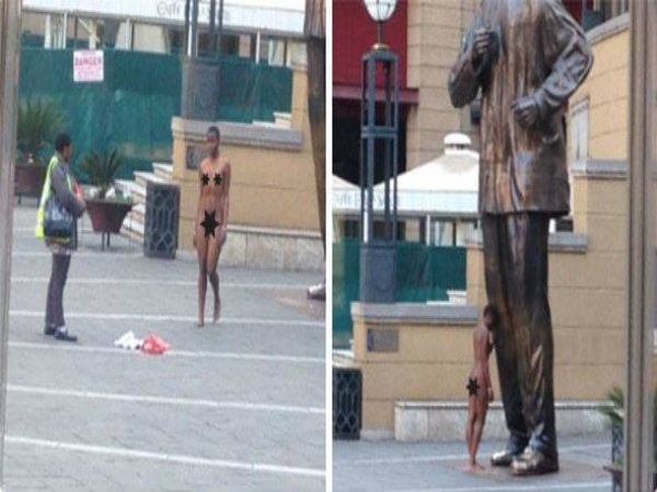 Woman Strips Naked to Hug Mandela Statue in South Africa Woman Strips Naked to Hug Mandela Statue in South Africa