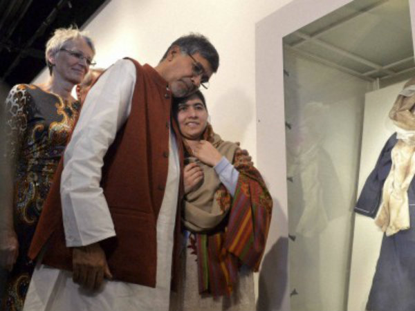 Malala weeps at sight of bloodied school uniform Malala weeps at sight of bloodied school uniform