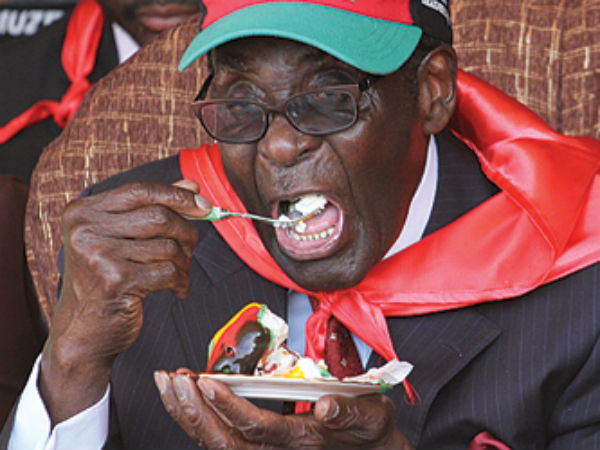 Robert Mugabe eats a zoo for 'obscene' 91st birthday party Robert Mugabe eats a zoo for 'obscene' 91st birthday party