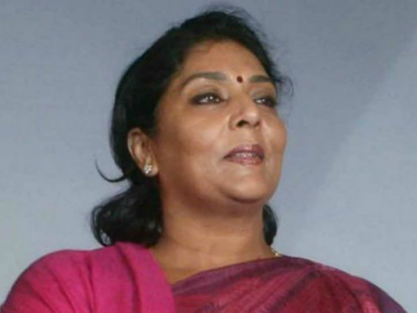 Woman slaps Renuka Choudhary's follower with chappal Woman slaps Renuka Choudhary's follower with chappal