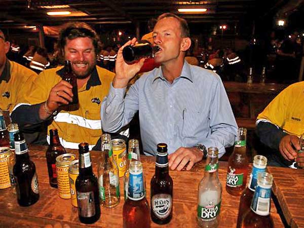 Australia's Tony Abbott downs beer in 7 seconds amid chants of Skol! Australia's Tony Abbott downs beer in 7 seconds amid chants of Skol!