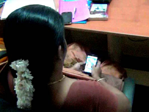 Tamil Nadu Officer Caught Playing Candy Crush on Phone at Farmers' Meet Tamil Nadu Officer Caught Playing Candy Crush on Phone at Farmers' Meet