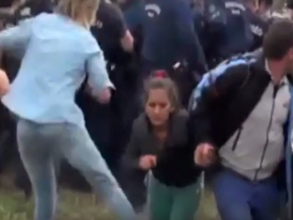 Video journalist fired after apparently kicking, tripping refugees in Hungary Video journalist fired after apparently kicking, tripping refugees in Hungary