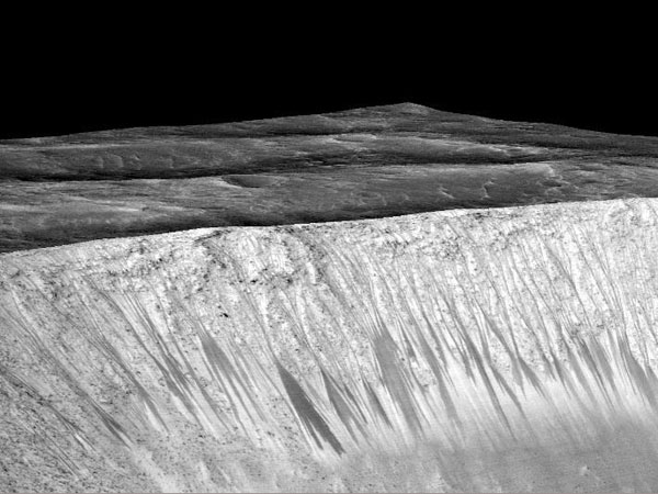 Liquid water exists on Mars, boosting hopes for life there, NASA says Liquid water exists on Mars, boosting hopes for life there, NASA says