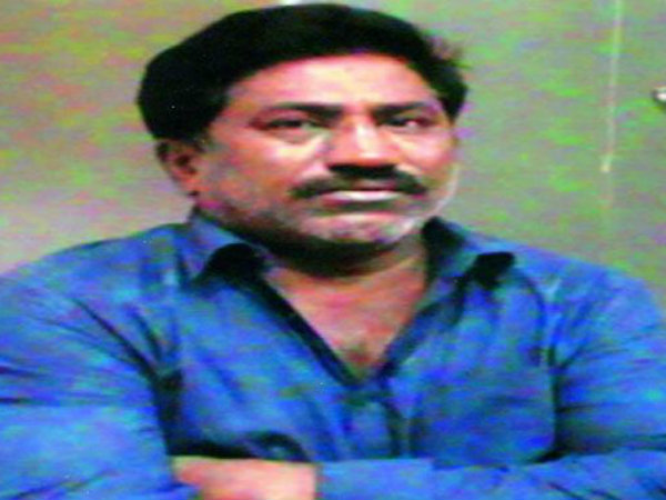 Red Sander smuggler Gangi Reddy brought to Hyderabad Red Sander smuggler Gangi Reddy brought to Hyderabad