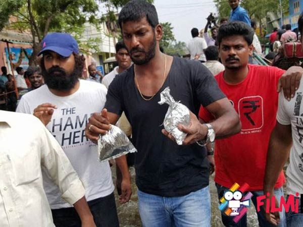 Chennai Floods: Vishal helps people Chennai Floods: Vishal helps people