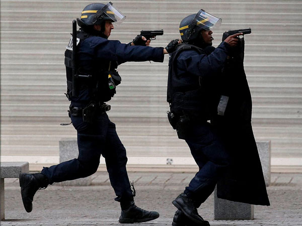 Armed man killed at police station year after Paris attacks Armed man killed at police station year after Paris attacks
