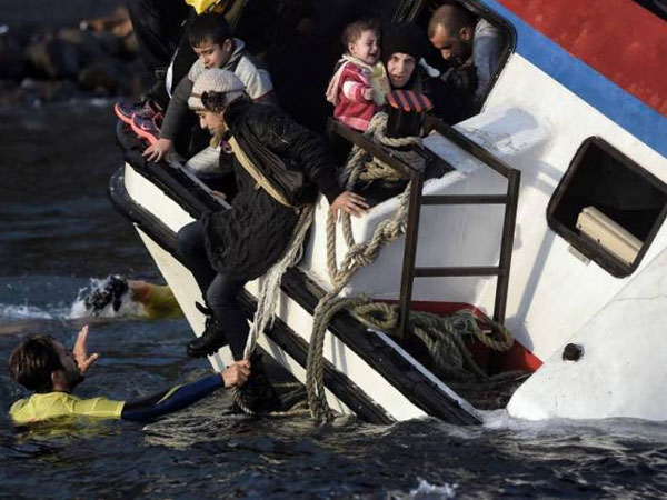 Six children among 21 dead as two migrant make shift wooden sailboats sink off Greek islands Six children among 21 dead as two migrant make shift wooden sailboats sink off Greek islands