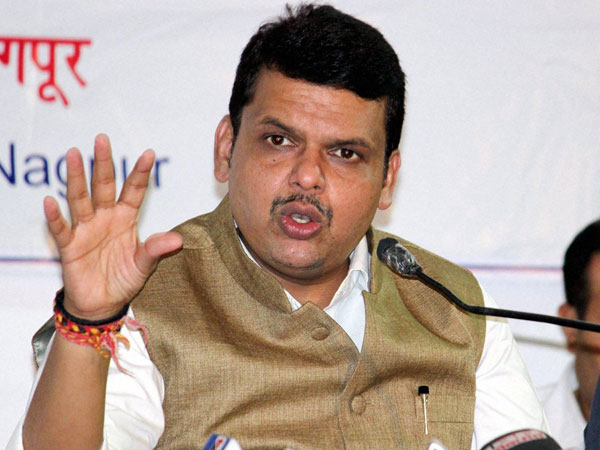 Magic chain by godman lands Devendra Fadnavis' wife in row Magic chain by godman lands Devendra Fadnavis' wife in row