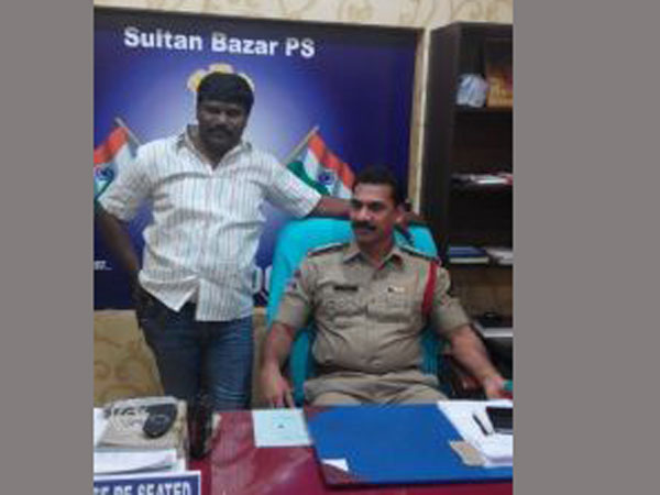 Friendly policing? Offender sits in inspector's chair, clicks pics with him Friendly policing? Offender sits in inspector's chair, clicks pics with him