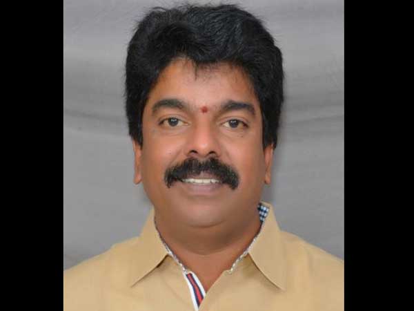 TDP MLA Bonda Uma cleans BJP leaders car TDP MLA Bonda Uma cleans BJP leaders car