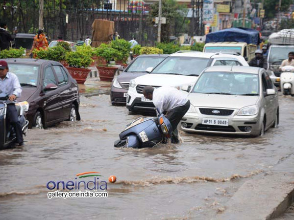 Public life stand still in Warangal due to heavy rains Public life stand still in Warangal due to heavy rains