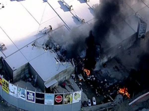 Five feared dead after plane crashes into into shopping centre near Melbourne Five feared dead after plane crashes into into shopping centre near Melbourne