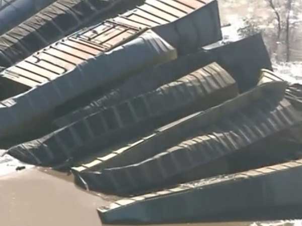 22 freight train cars tumble into flooded Northern California river after derailment 22 freight train cars tumble into flooded Northern California river after derailment