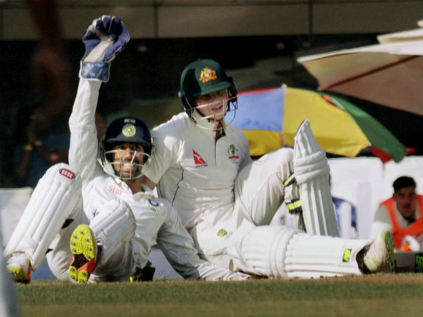Wriddhiman Saha & Steve Smith tumble on field, end up in awkward position Wriddhiman Saha & Steve Smith tumble on field, end up in awkward position