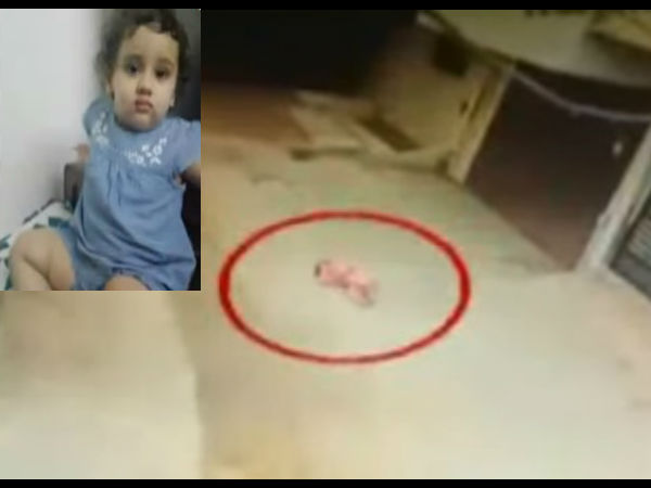 A girl child fell in the ground from house second floor A girl child fell in the ground from house second floor