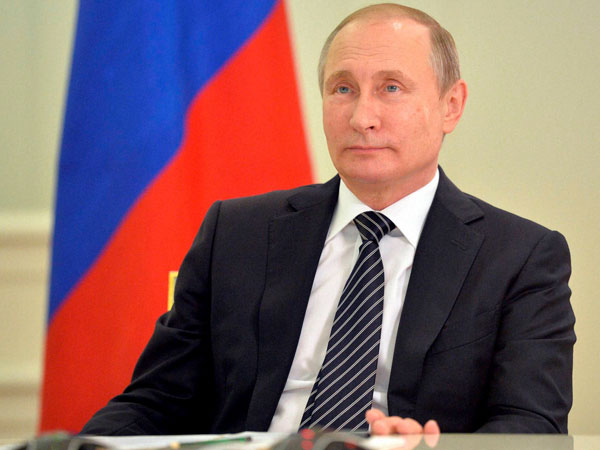 Putin plays down ties with President Trump's ex-adviser Flynn Putin plays down ties with President Trump's ex-adviser Flynn