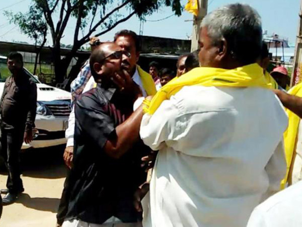 Hindupur muncipal chairperson husband attacks protesters Hindupur muncipal chairperson husband attacks protesters