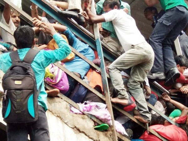 Mumbai Elphinstone bridge stampede caused by heavy rain, says Western Railway report Mumbai Elphinstone bridge stampede caused by heavy rain, says Western Railway report