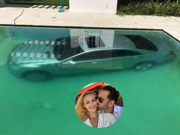 Jilted girlfriend of prominent US banker dumps his Mercedes into swimming pool Jilted girlfriend of prominent US banker dumps his Mercedes into swimming pool
