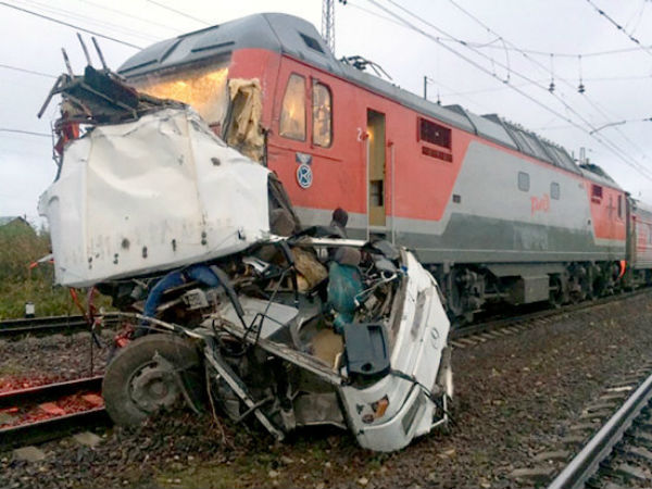 Total devastation as train ‘tears apart’ bus, killing 19 including child Total devastation as train ‘tears apart’ bus, killing 19 including child