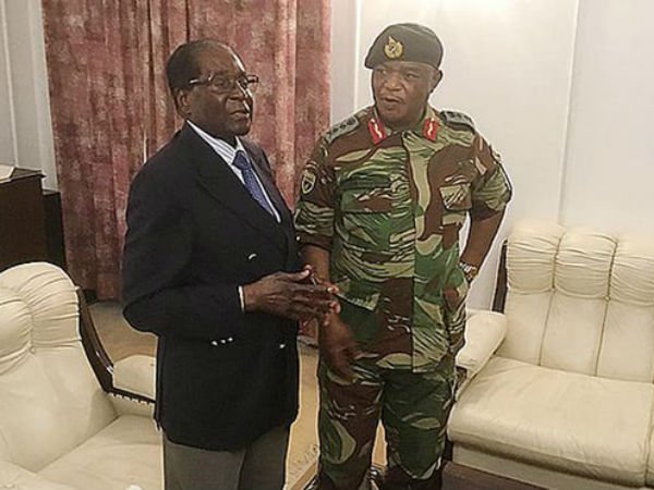 Mugabe resists pressure to resign as detention pictures emerge Mugabe resists pressure to resign as detention pictures emerge