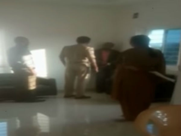 బూటుకాలితో తన్నినందుకు వేటు