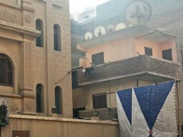 Gunman launches deadly attack on Coptic church near Cairo Gunman launches deadly attack on Coptic church near Cairo