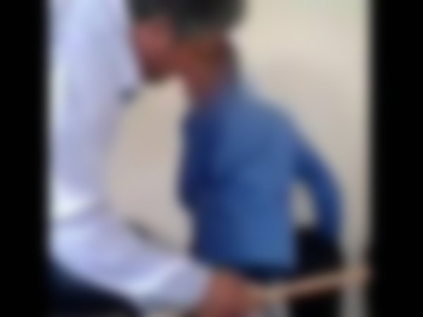 Teacher beaten Students with his Sandal for not telling telugu poem Teacher beaten Students with his Sandal for not telling telugu poem