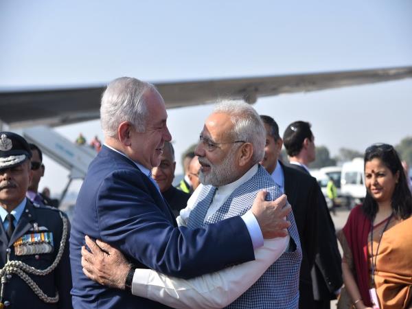 PM Modi breaks protocol, receives Benjamin Netanyahu at airport with a hug PM Modi breaks protocol, receives Benjamin Netanyahu at airport with a hug