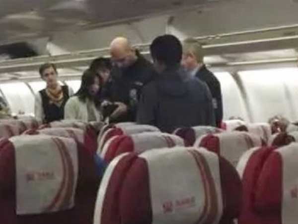Gang robbery on flight from Beijing to Prague stuns China Gang robbery on flight from Beijing to Prague stuns China