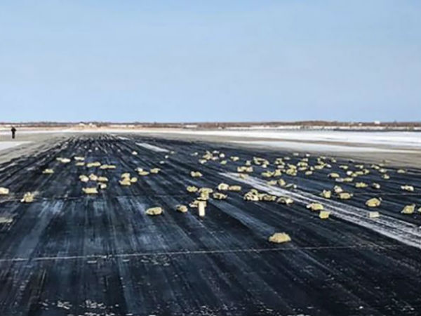 3 tonnes of gold spills on runway after plane door glitch 3 tonnes of gold spills on runway after plane door glitch