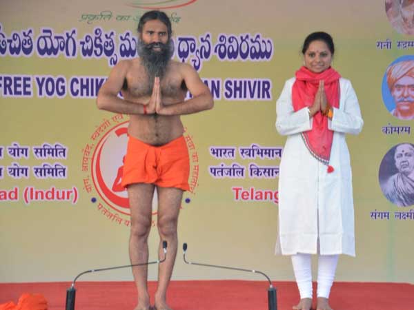 Ramdev invites Harish, Kavitha to yoga camp in Nizamabad Ramdev invites Harish, Kavitha to yoga camp in Nizamabad