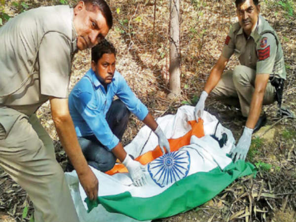 Delhi cops give tricolour burial to peacock, say its protocol Delhi cops give tricolour burial to peacock, say its protocol
