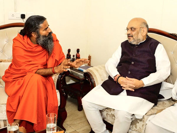 Amit Shah meets Yoga guru Ramdev as part of BJPs outreach exercise Amit Shah meets Yoga guru Ramdev as part of BJPs outreach exercise