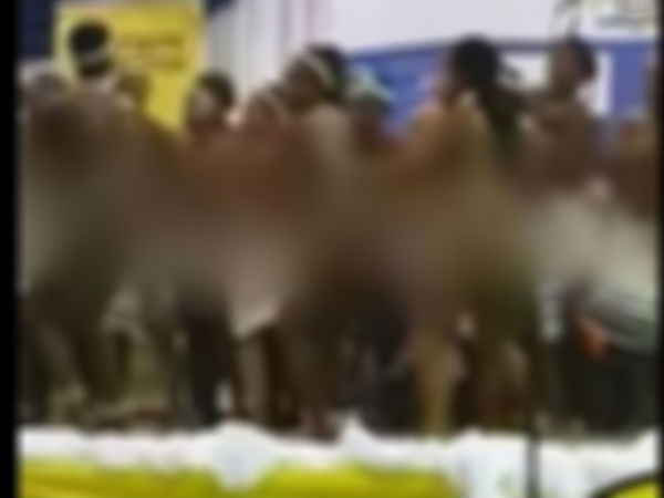 అర్ధనగ్నంగా విద్యార్థులతో నృత్యాలు