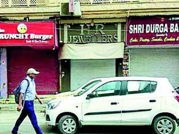 Jewellery owner shot dead in front of his son Jewellery owner shot dead in front of his son