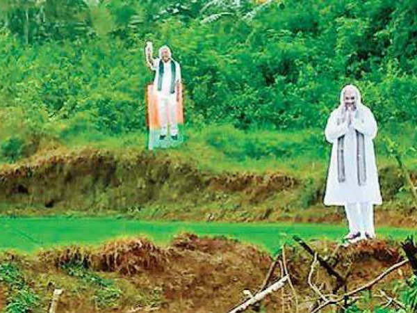 Modi and Shah cut outs used as scarecrows in Karnataka fields Modi and Shah cut outs used as scarecrows in Karnataka fields