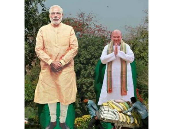 Modi and Shah cut outs used as scarecrows in Karnataka fields Modi and Shah cut outs used as scarecrows in Karnataka fields