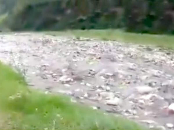 A small rain, River in Himalayas is filled with plastic and trash A small rain, River in Himalayas is filled with plastic and trash
