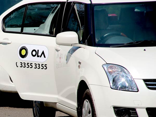 Ola driver allegedly attempted to beat a woman passenger near SBM circle in Bengaluru Ola driver allegedly attempted to beat a woman passenger near SBM circle in Bengaluru
