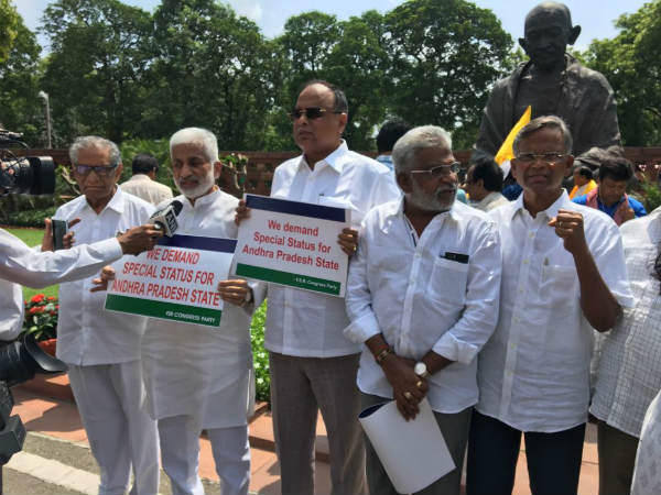 ysrcp former mps protests infront gandhi statue at parliament ysrcp former mps protests infront gandhi statue at parliament