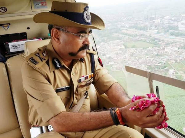 UP ADG lands in trouble after throws rose petals on Kanwar pilgrims from a rented chopper UP ADG lands in trouble after throws rose petals on Kanwar pilgrims from a rented chopper