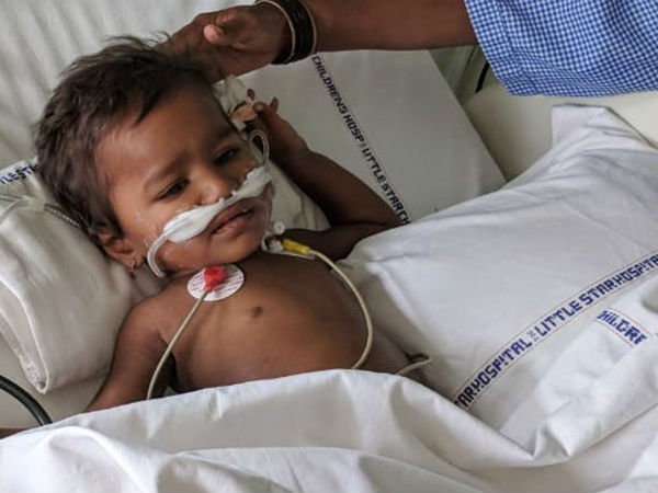 This family need RS 10 lakhs for their child health This family need RS 10 lakhs for their child health