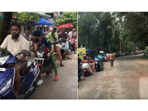Floods aftermath:These people wait with patience for hours to fill their petrol tanks Floods aftermath:These people wait with patience for hours to fill their petrol tanks