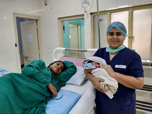 Kerala woman rescued by navy delivers baby boy Kerala woman rescued by navy delivers baby boy