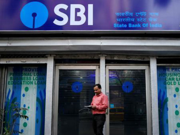 SBI reports shock loss of Rs 4,876 crore in Q1 SBI reports shock loss of Rs 4,876 crore in Q1