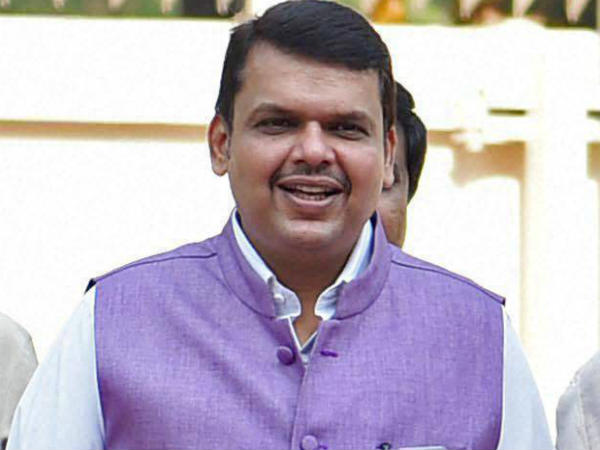 బీజేపీ సీఎంతో కాంగ్రెస్ మంత్రి
