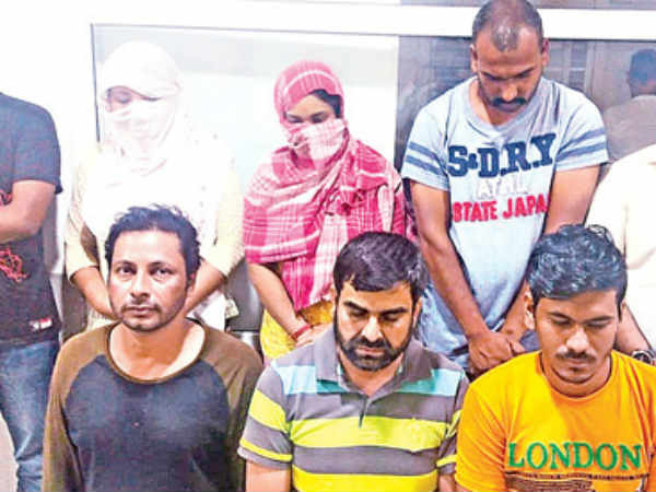 Police raid massage parlours over charges of prostitution, eight arrested Police raid massage parlours over charges of prostitution, eight arrested